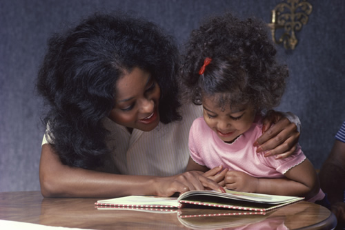 Mom and daughter reading 