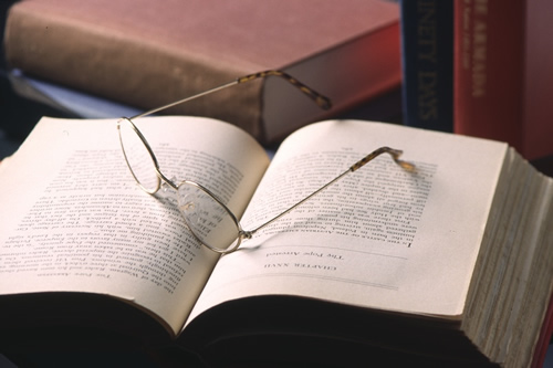 Image of glasses on book