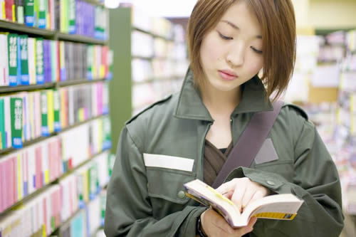 student reading in library